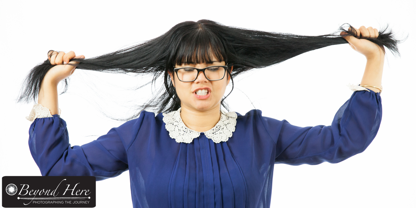 woman pulling hair